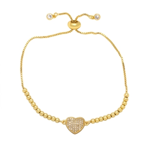 Adjustable gold bracelet with heart pendant pave set with sparkling white zircon crystals