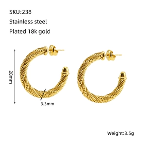 Macro view of 18K gold plated twisted hoop earrings with detailed size and weight specs