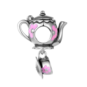 Macro detail of S925 silver teapot and teacup charm with pink enamel floral patterns