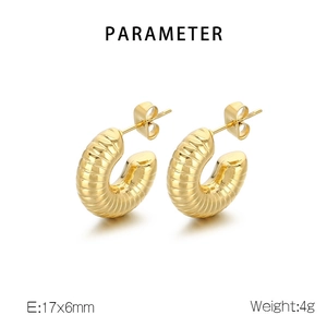 Detailed view of gold C-shape ridged earrings measuring 17x6mm with hollow design