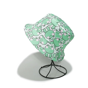 Detailed stitching of cotton sun bucket hat with cute green frog cartoon prints