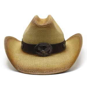 Classic Western straw cowboy hat with leather band and eagle emblem on white background
