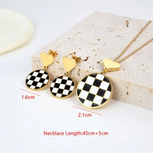 Checkboard heart necklace and earrings set with dimensions and golden trim details