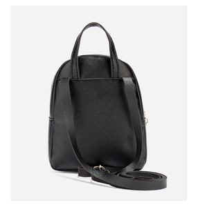 Detailed view of the back of a black PU leather mini backpack with adjustable shoulder straps