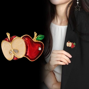 Vintage red enamel apple brooch with gold plating and rhinestone accents for Christmas