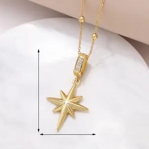 Detail showing gold plated zircon star pendant with dimensions forty mm by twenty-two mm