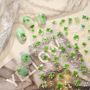 Fresh green four leaf clover nail art stickers with small stars and plaid patterns