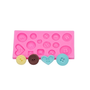 Pink silicone button mold for fondant cakes and resin clay with finished samples