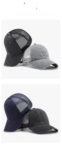 Vertical view of washed mesh trucker hats in four colors including dark grey and navy
