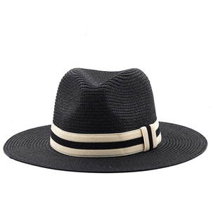 Classic black Panama hat with wide brim and elegant beige-black striped ribbon band