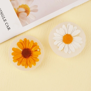 Detailed macro view of round silicone molds for creating daisy pattern resin crafts