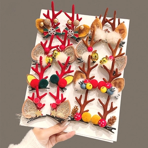 12-piece Christmas antler hair clip set with bells and bows in red and brown colors