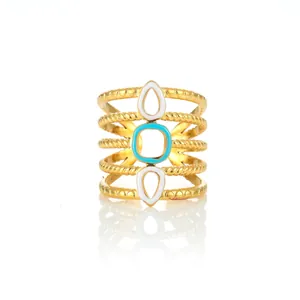 Macro view of five-layer gold ring with twisted rope bands and enamel accents