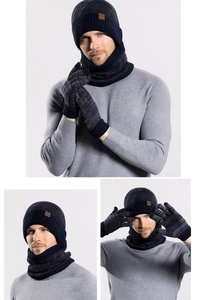 Detail view of navy blue knitted winter set including hat, scarf and warm gloves