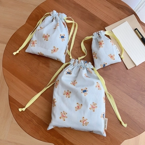 Three-piece set of blue striped cotton drawstring storage bags with cute bear patterns