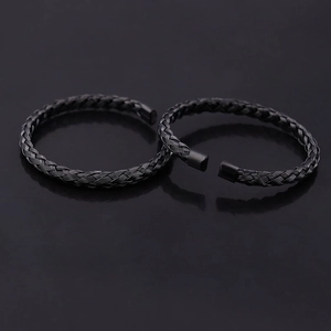 Minimalist black braided stainless steel open bangle bracelet with a punk wire texture