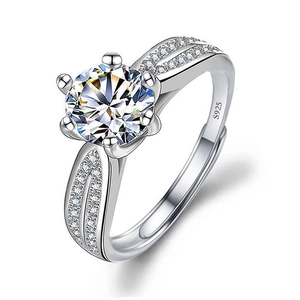 Detail of S925 sterling silver ring with six-prong set cubic zirconia and pavé band