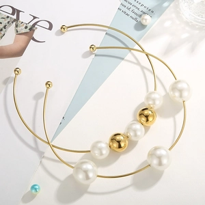 Exaggerated gold stainless steel choker necklace with large white pearls and metal beads