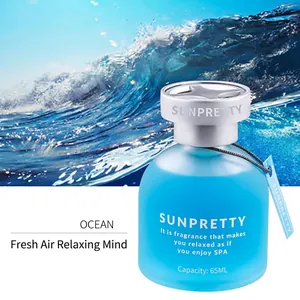 Detail of blue frosted glass 65ml car scent diffuser bottle with ocean scent