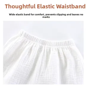 Detail view of the high-elasticity waist on pure cotton gauze baby shorts
