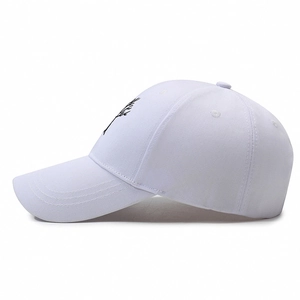 White cotton baseball cap with black tree branch embroidery and adjustable strap