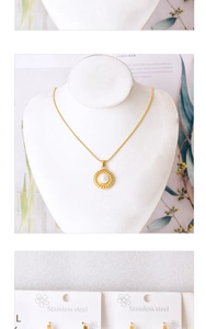 Detailed view of an 18k gold plated stainless steel necklace with pearl pendant