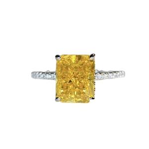 S925 sterling silver ring with large yellow radiant cut stone and pavé diamond accents