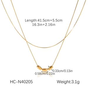 Detail view of gold layered necklace with triple bean pendants and size specifications