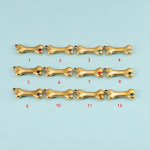 Set of 12 gold bone-shaped pendants with colorful zircons for DIY jewelry making