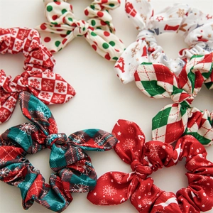 Set of 6 Christmas fabric hair scrunchies with bow tie design in festive patterns