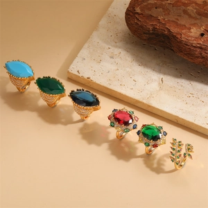 Luxurious gold rings with marquise and oval cut zircons in various vibrant colors