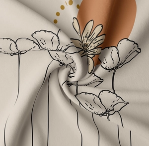 Détail macro d'une tapisserie bohème montrant le tissu doux et le motif floral