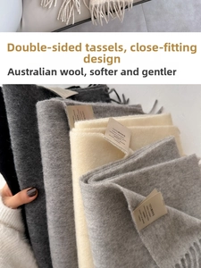 Close-up of premium 100% Australian wool scarves showing soft texture and tassel details