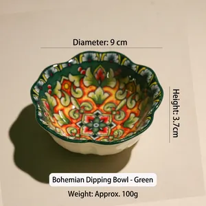 Detail view of 9cm bohemian ceramic sauce dish with colorful geometric floral patterns