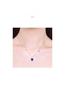 Detailed close-up of S925 silver Capricorn necklace featuring a blue square gemstone