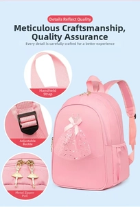 Detail of pink ballet backpack with tutu decor, metal zipper and adjustable straps
