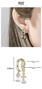 Detail view of heart and cross charm earrings showing size measurements and dimensions