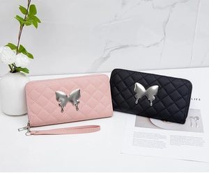 Quilted long wallets in pink and black featuring silver melting butterfly accents