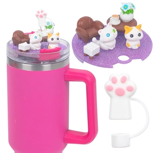 Detail of pink 40oz tumbler lid with cute cat figurines and cat paw straw cover