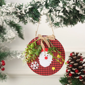 Macro detail of a wooden Christmas door sign featuring Santa Claus and red buffalo plaid