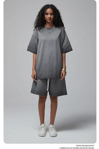 Close-up of vintage washed grey cotton t-shirt and shorts set with dropped shoulders