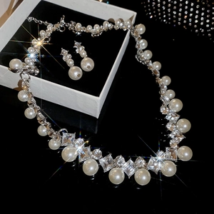 Elegant diamond-encrusted diamond-shaped pearl necklace and earrings jewelry set in gift box