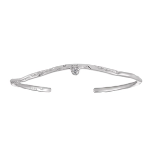 Irregular wave silver bangle with sparkling zircon stone in a minimalist open design