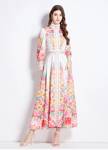 Detailed view of floral print maxi dress featuring stand collar and button-down front design