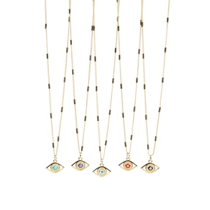 Detailed view of five colorful enamel evil eye pendants on gold-plated bar link chains