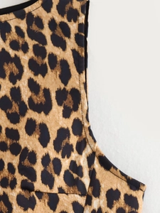 Close-up of leopard print summer dress showing premium edge stitching and fabric detail