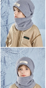 Detail of children's grey polar fleece winter hat and neck warmer with mountain logo