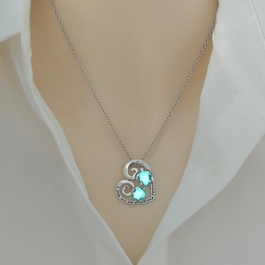 Detail of heart turtle necklace with 'I love you for always and forever' engraving