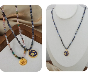 Detail of beaded necklace with 316L stainless steel angel pendant and colorful stones