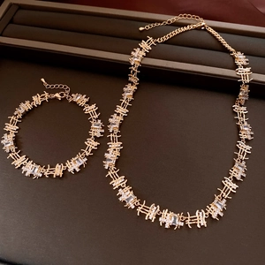 Detail view of gold lobster clasp and adjustable chain on zircon jewelry set